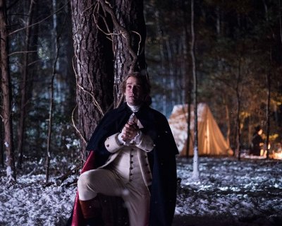 George Washington prays to his brother's ghost.